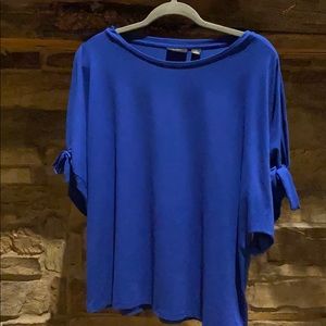 Woman’s blue blouse
